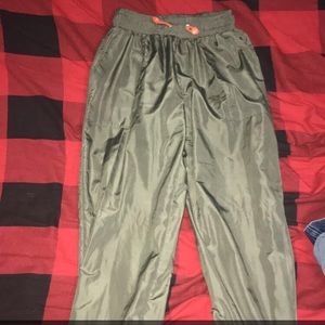 green windbreaker pants